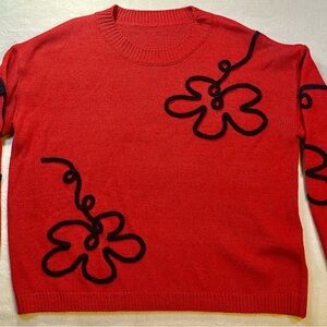 Women’s Boxy Red Sweater with Playful Raised Black Passementerie Floral Design